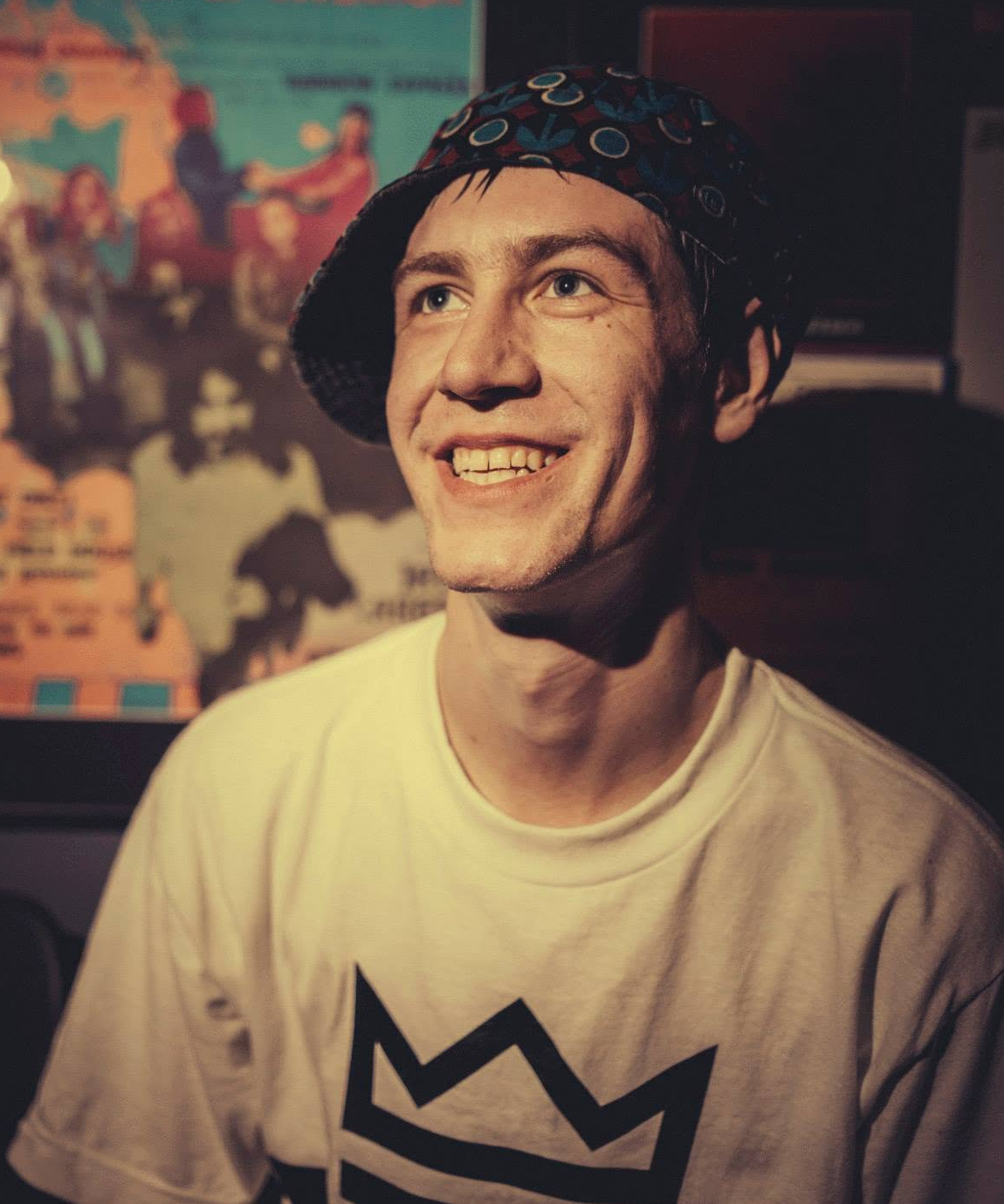 Portrait of Derek Boe smiling in his studio