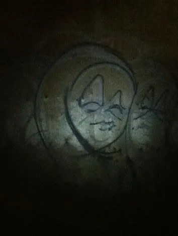 Dark draft sketch of the face for the FUSE mural