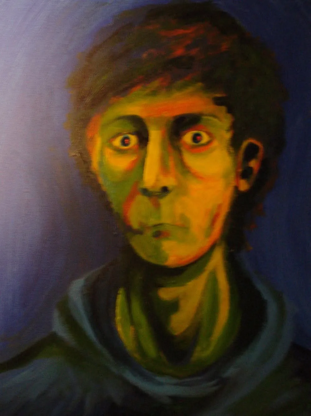 Acrylic self portrait with a green-yellow face on a dark blue ground, 2014