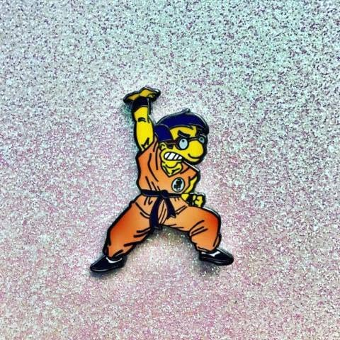 Krillin Simp Saiyan enamel pin produced by Flower Chainz Collective